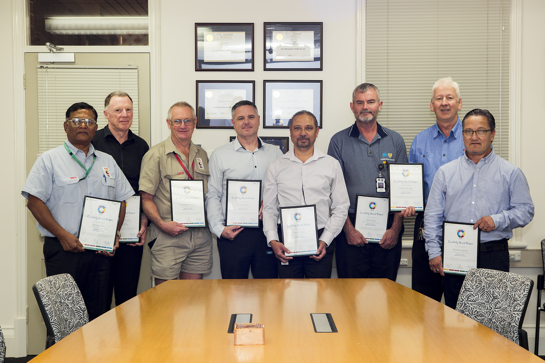 Picture of members of the Facilities Management and Infrastructure Team with their Q1 ViA awards.